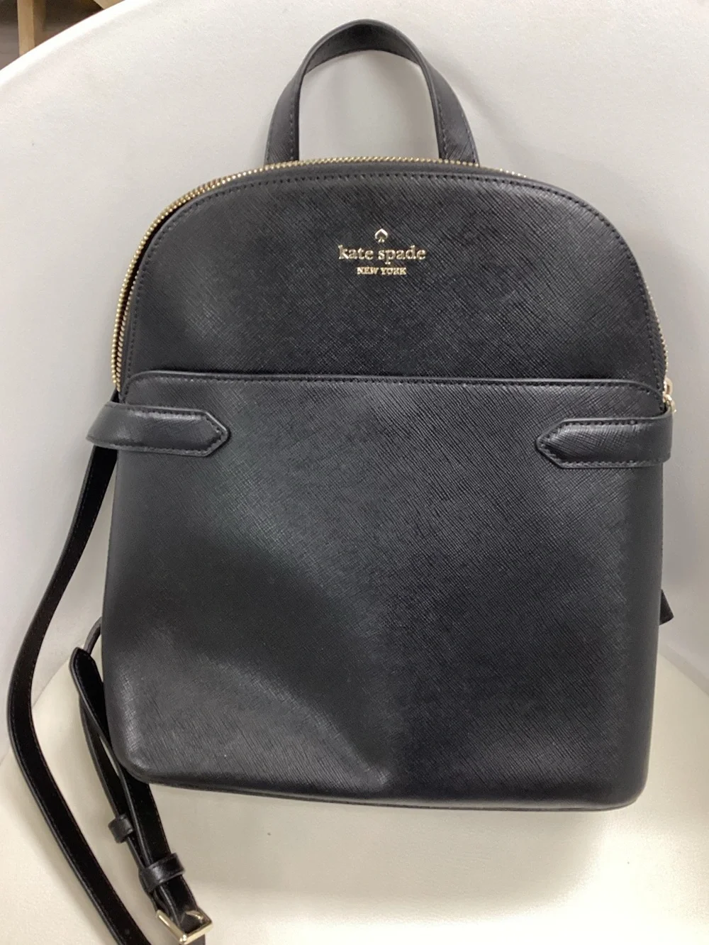 kate spade black leather backpack with gold logo